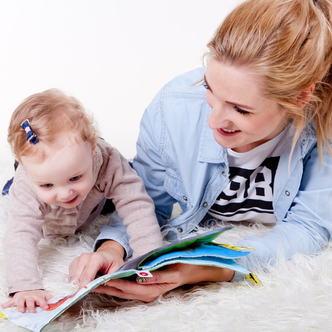 mother and baby reading